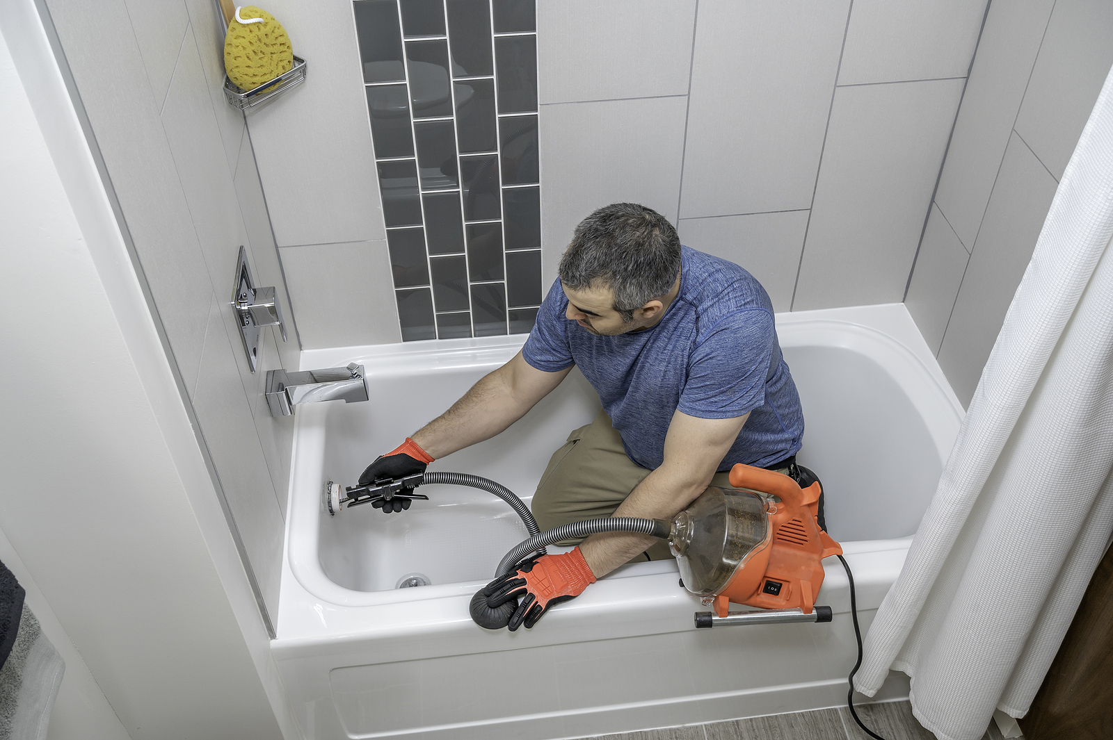 How to Remove a Bathtub Drain Stopper by Type